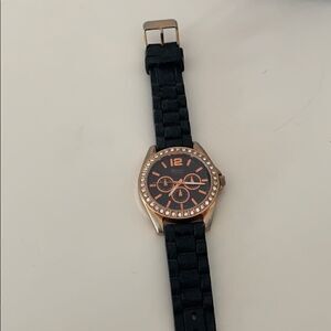 Balck and gold watch  